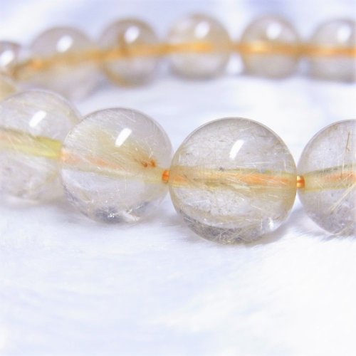 別のアングル写真1: 現品一点物  11ミリ  ゴールド  ルチル  クォーツ  ブレス   虹入り金針水晶  天然石  数珠  36g  R84  最強金運  開運招来  パワーストーン  ルチル  開運  1点物  目玉  ギフト  贈り物    誕生日  / 誕プレ 魔除け 運気向上 お揃い プレゼント お祝  高品質 / 京海堂