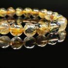 別のアングル写真1: 一点物 太陽放射タイチンルチル ブレスレット 金針水晶 数珠 8ミリ ２１ｇ ＴＨＲ１２ 商品動画あり