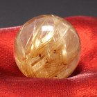 別のアングル写真2: 極太金針強パワールチル 一点物 ゴールドタイチンルチル スフィア 23mm 15ｇ RSF6 【動画有】縁起が良い赤座布団付 水晶のお守り効果 不思議な力   誕生日 贈り物 プレゼントにも ギフト 京海堂