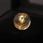 別のアングル写真3: 超高品質タイチン太針ルチル【透明感抜群のゴールドルチル】GHTU1 約11ミリ 一点物 1粒売り ハンドメイド 巾着1枚＆座布団付 【石言葉*洞察力の向上/直観力/金運/家族円満】 金針水晶 お守り効果 ご褒美 お揃い ギフト 京海堂
