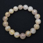 別のアングル写真2: 乳白色が魅力のゴールドルチル【珠にしっかり金針が入ったブレスレット】 11mm 一点物【 GHB23・34g】ルチルクォーツブレスレット コーディネートしやすいブレスレット お守り効果 魔除け効果も プレゼント 贈り物 浄化発送 ギフト 京海堂
