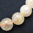 別のアングル写真1: 乳白色が魅力のゴールドルチル【珠にしっかり金針が入ったブレスレット】 11mm 一点物【 GHB23・34g】ルチルクォーツブレスレット コーディネートしやすいブレスレット お守り効果 魔除け効果も プレゼント 贈り物 浄化発送 ギフト 京海堂