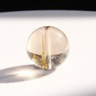 別のアングル写真1: V型 金針が魅力の1点！13.5ミリ タイチン太針ルチル【GHTU4・4g】 一点物 1粒売り ハンドメイド 交換用ゴム付＆巾着1枚 【勝負運向上・金運・家族円満・受験合格】 金針水晶 お守り効果 ご褒美 お揃い ギフト 京海堂