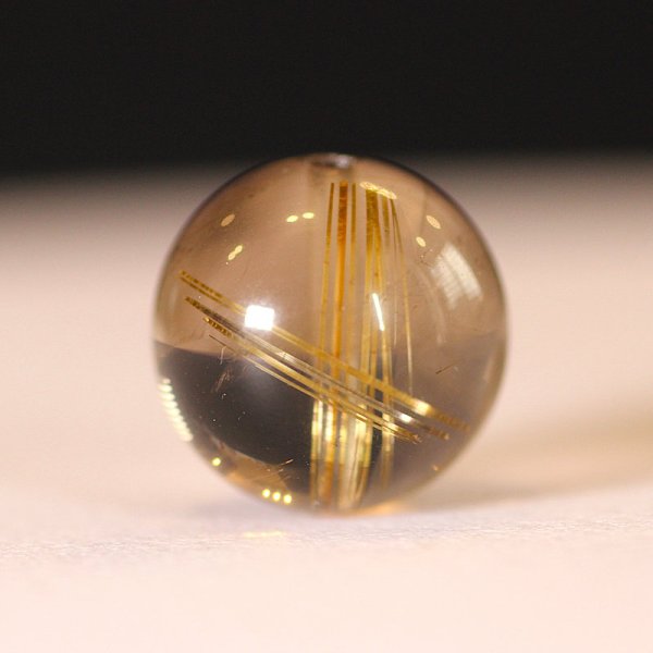 画像1: 透明感抜群X金針が綺麗なスモーキールチル！12ミリ【GHTU6・3g】 一点物 1粒売り ハンドメイド 交換用ゴム付＆巾着1枚 【心身安定、エネルギー浄化、魔除け、厄除け】 金針水晶 お守り効果 ご褒美 お揃い ギフト 京海堂