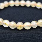 別のアングル写真1: 無数の金針が美しくやわらかい光を放ちます ゴールドルチル7mm 一点物【GHB19】ルチルクォーツブレスレット 金運、仕事運向上、成功、心の浄化、直感力を高める プレゼント 贈り物 水晶 13ｇ 浄化発送 ギフト 京海堂
