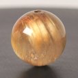 画像2: 繊細なルチルの束が優しい一粒 約14ミリ ゴールドルチルクォーツ【GHTU13 5g】 一点物 1粒売り ハンドメイド 交換用ゴム付＆巾着1枚 【金運・人間関係を向上・仕事運・家族円満】 金針水晶 お守り効果 ご褒美 お揃い ギフト 京海堂 (2)