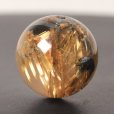 画像2: 目が離せない一粒！ 約14ミリ 太陽放射ルチルクォーツ【GHTU17 5g】 一点物 1粒売り ハンドメイド 交換用ゴム付＆巾着1枚 【金運アップ・目標達成・家族円満・自己肯定感】 金針水晶 お守り効果 ご褒美 お揃い ギフト 京海堂 (2)