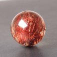 画像1: 赤い針の集合が美しい 約12ミリ レッドルチルクォーツ【GHTU20 3g】 一点物 1粒売り ハンドメイド 交換用ゴム付＆巾着1枚 【金運・家庭運・愛情運・恋愛成就・信頼関係】 金針水晶 お守り効果 ご褒美 お揃い ギフト 京海堂 (1)
