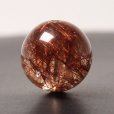 画像1: きめ細やかな美しさ シラー入りレッドルチルクォーツ 約12ミリ【GHTU21 3g】 一点物 1粒売り ハンドメイド 交換用ゴム付＆巾着1枚 【活力・家庭運・自信・勇気・成功運・目標達成】 金針水晶 お守り効果 ご褒美 お揃い ギフト 京海堂 (1)